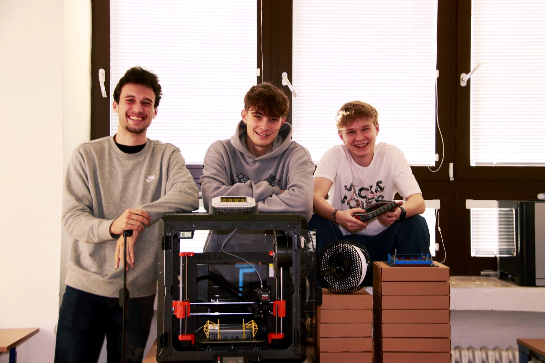 Original photograph of Šimon, David and Petr in the StadiArt workshop