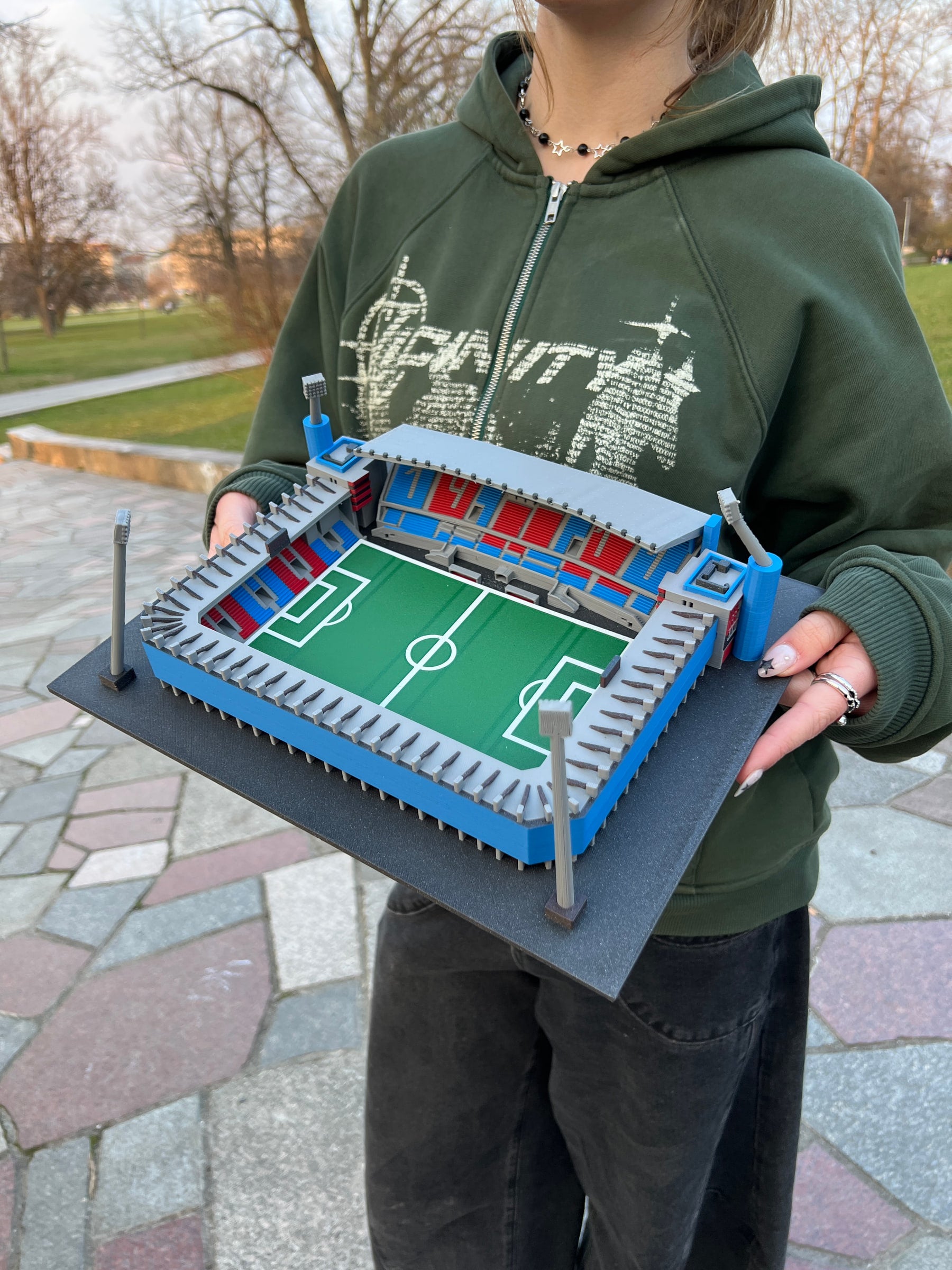 Original photograph showing the scale of a large coloured StadiArt stadium model