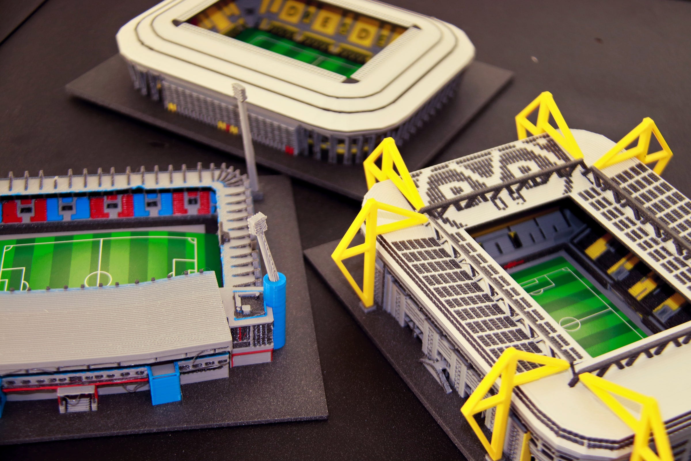 Original photograph of several standard StadiArt stadium models